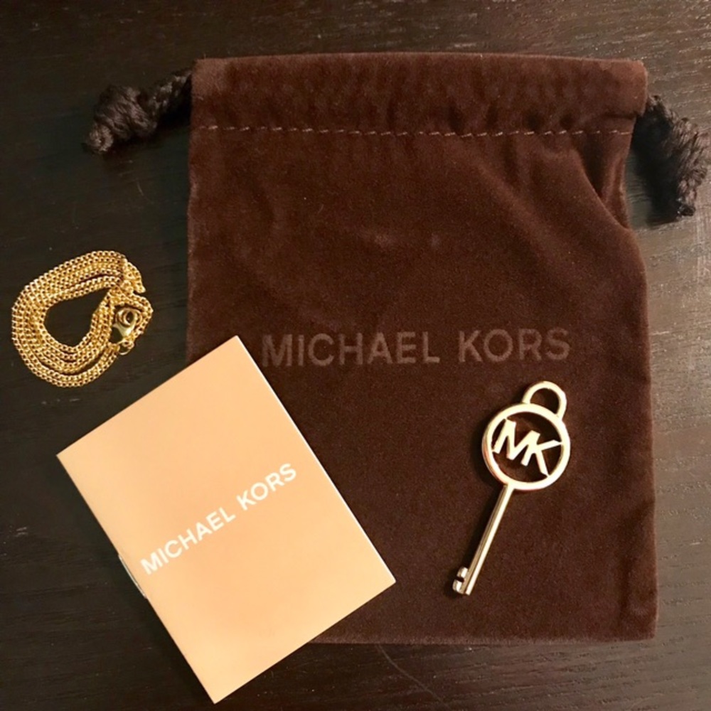 Authentic Michael Kors key charm NEW